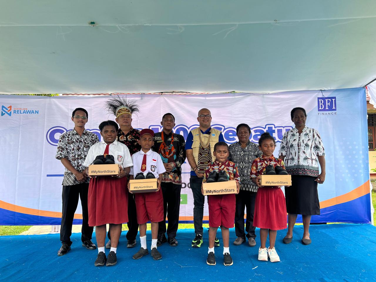 BFI Finance Distributes 1,000 Pairs of Shoes to Students in Papua Island